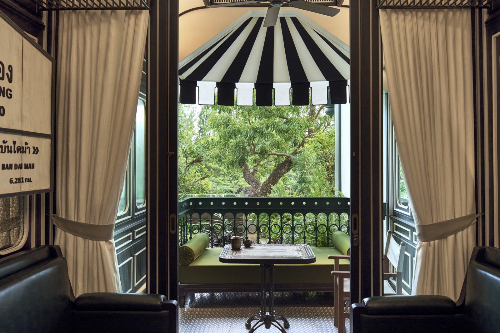 Some rail cars at the resort come with a private balcony with verdant views