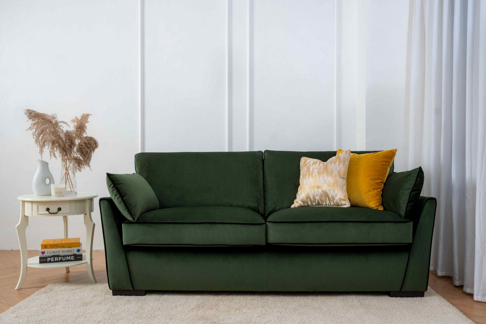 The Chloe sofa for Elle Home in moss green