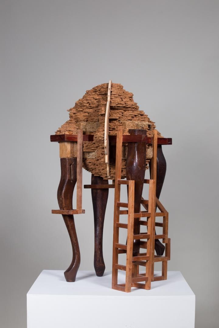 This is how we begin and how we end; wood cork, collected furniture part, wood and needle