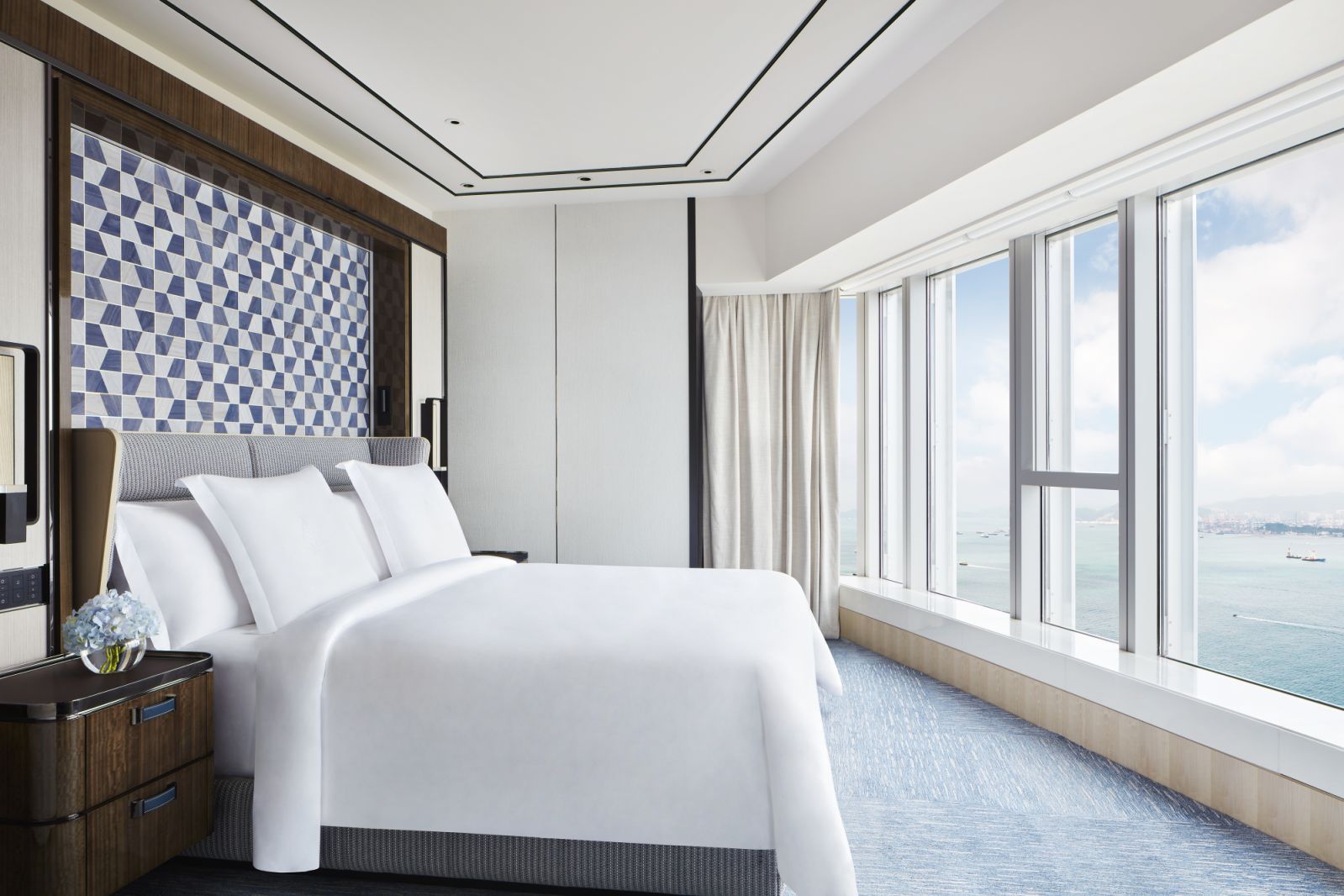 Superior Harbour-view suite bedroom at Four Seasons Hong Kong