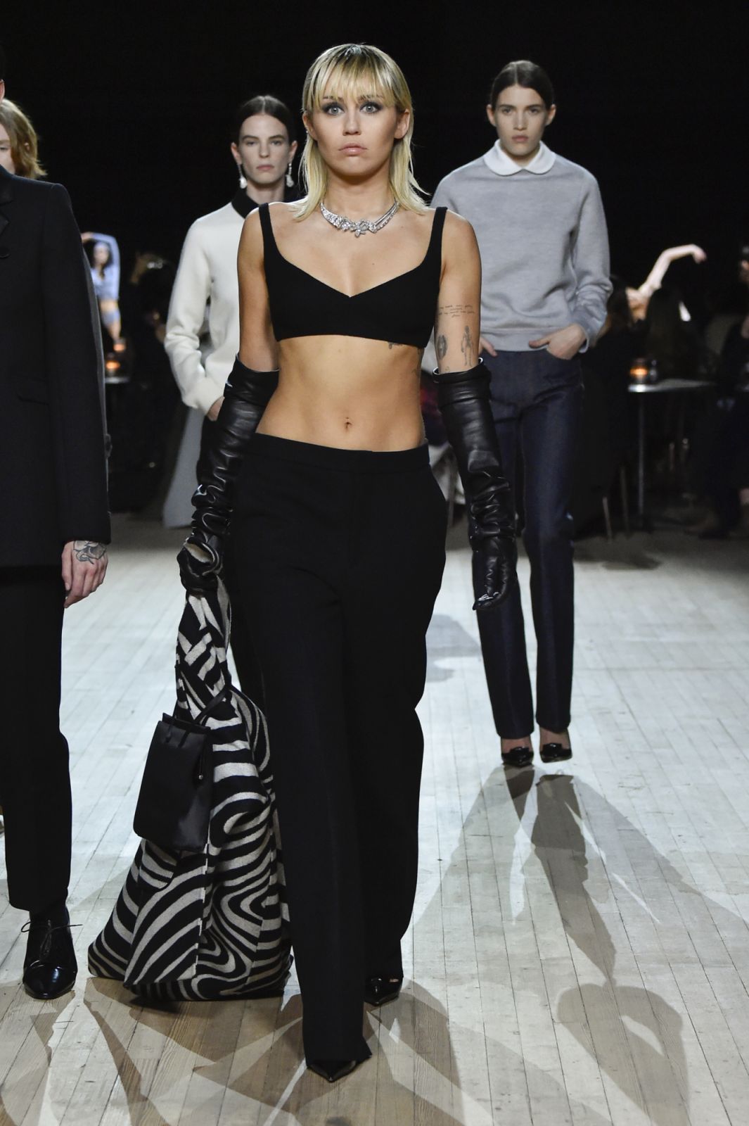 Miley Cyrus walks the runway at the Marc Jacobs Ready to Wear Fall/Winter 2020-2021 fashion show (Photo: Peter White/FilmMagic via Getty Images)