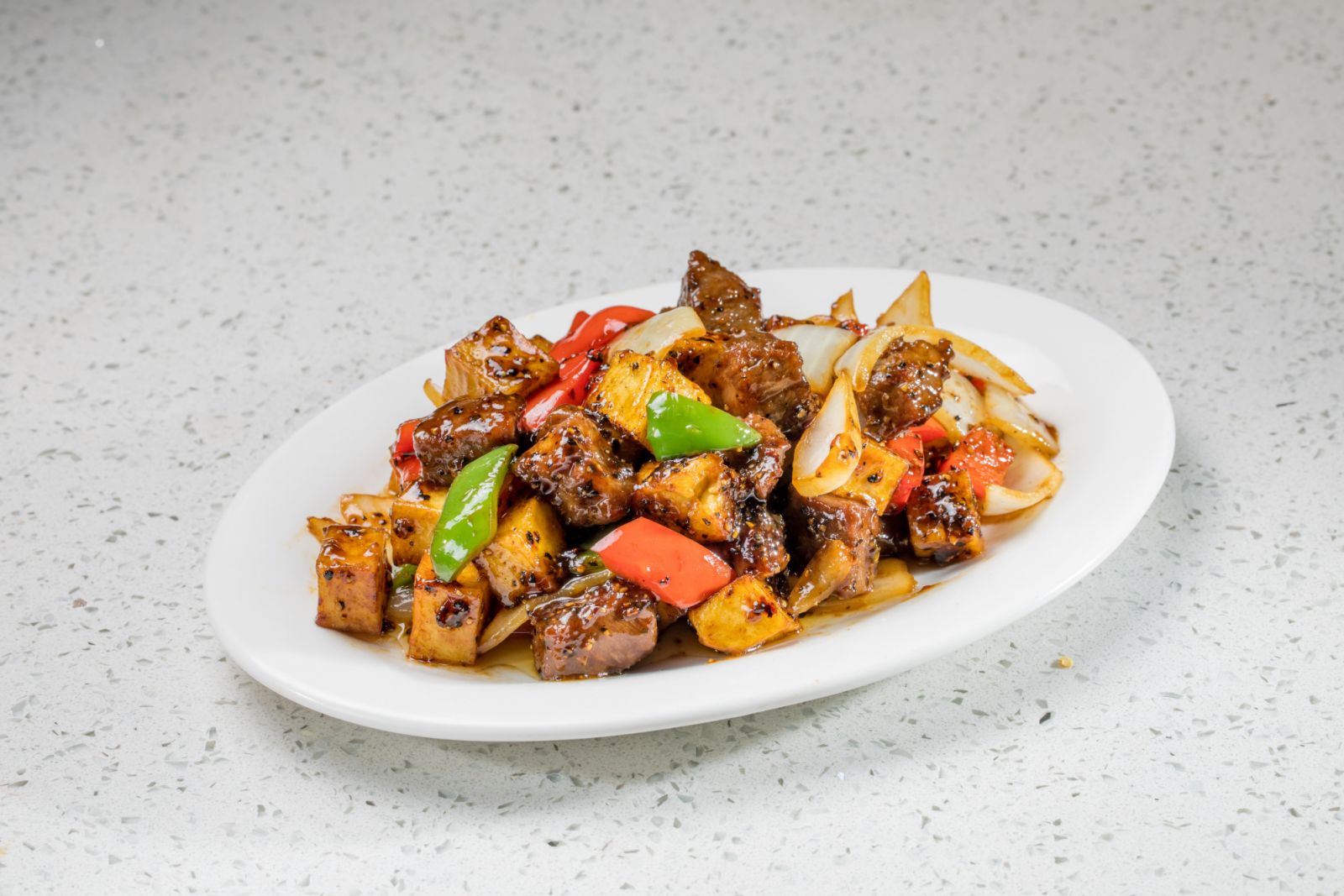 Diced beef with potato in honey pepper sauce