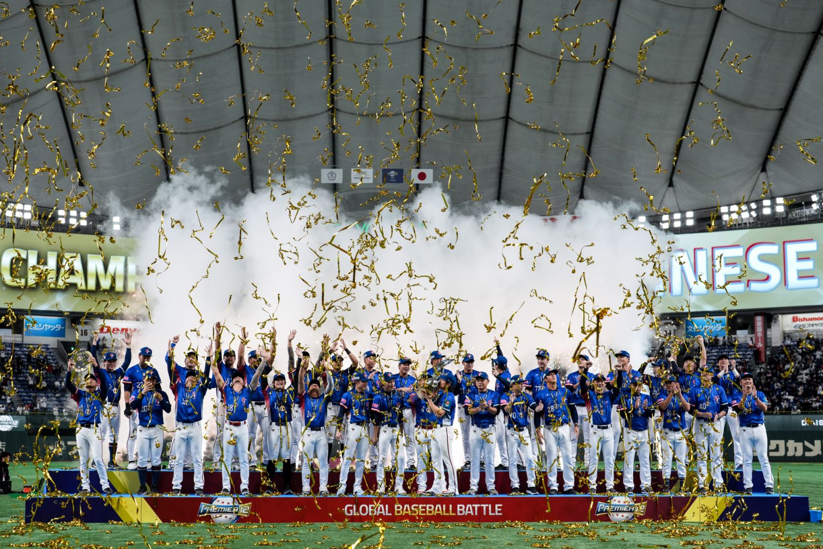 TOKYO, JAPAN - NOVEMBER 24: Members of Team Chinese Taipei pose with medals on the podium following the WBSC Premier12 Gold Medal game between Chinese Taipei and Japan at Tokyo Dome on November 24, 2024 in Tokyo, Japan. (Photo by Shi Tang/Getty Images)