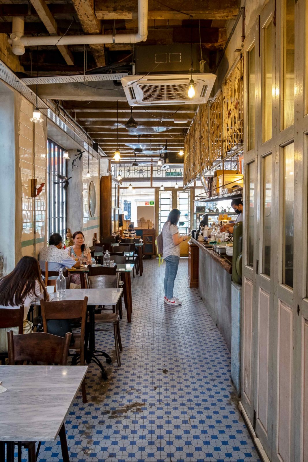 Timothy Cafe in Kuala Lumpur retains much of the traditional characteristics typical of Nanyang shophouses