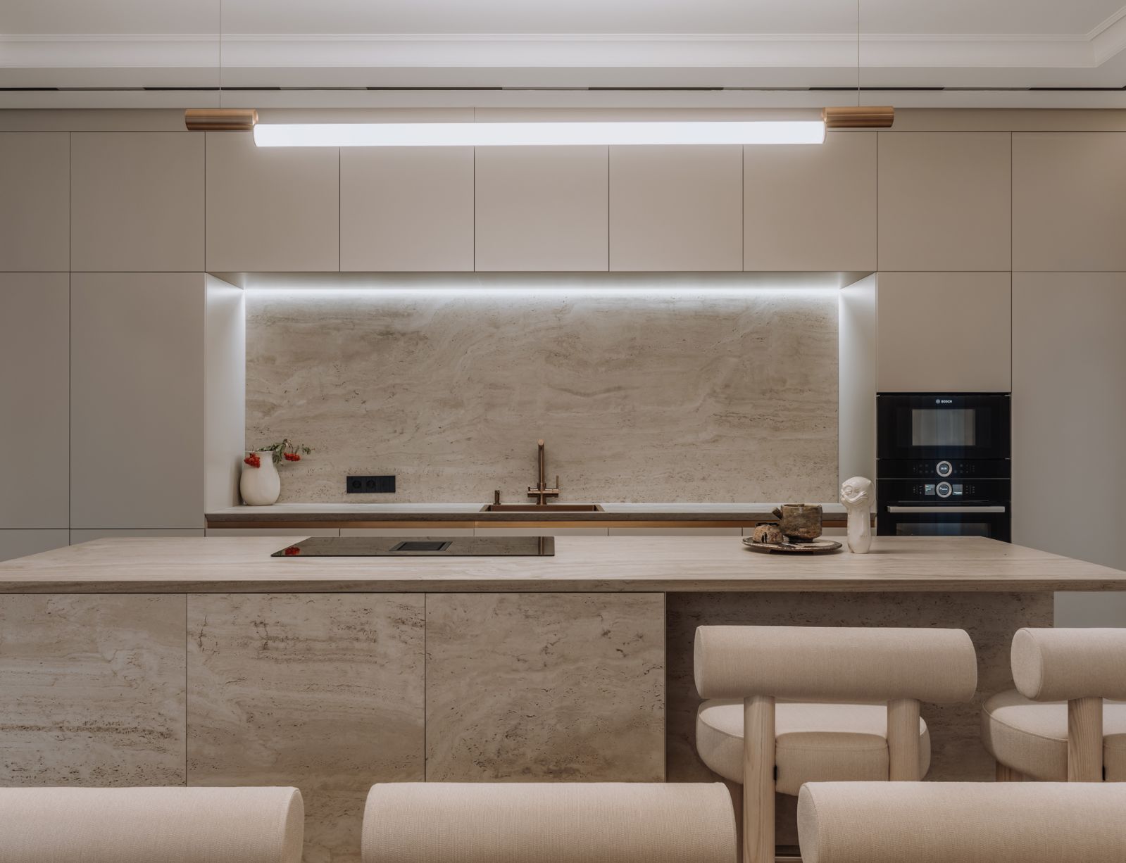 The pantry and kitchen island make for a cosy, informal dining space