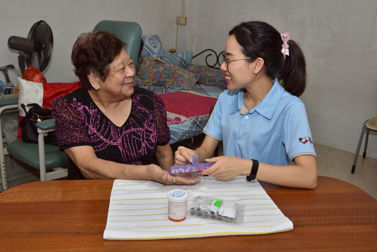 Home Nursing Foundation Singapore’s care professionals assist seniors with daily self-care activities, basic housekeeping and other care tasks (Photo: Home Nursing Foundation)