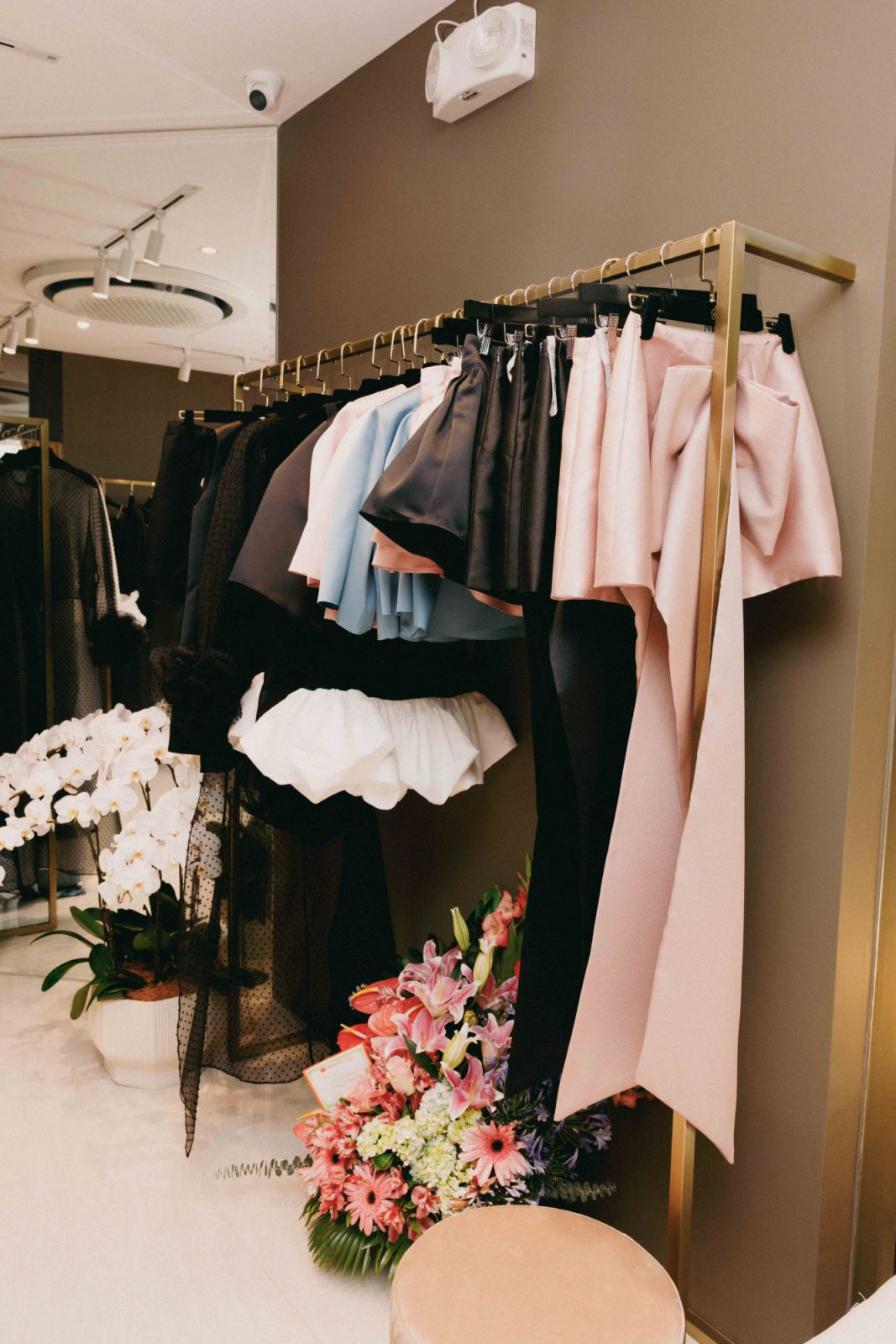 Feminine embellishments dominate this collection