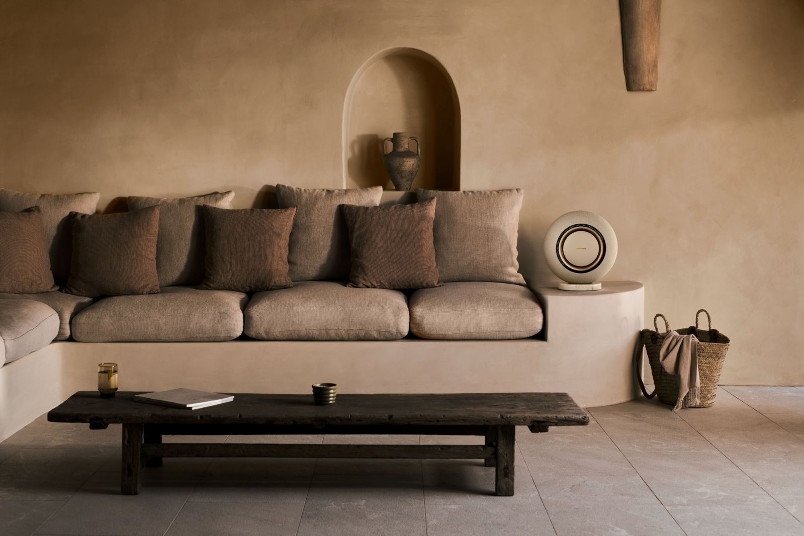 Positioned here as a table-top centrepiece, the Horizon speaker in Marantz Champagne