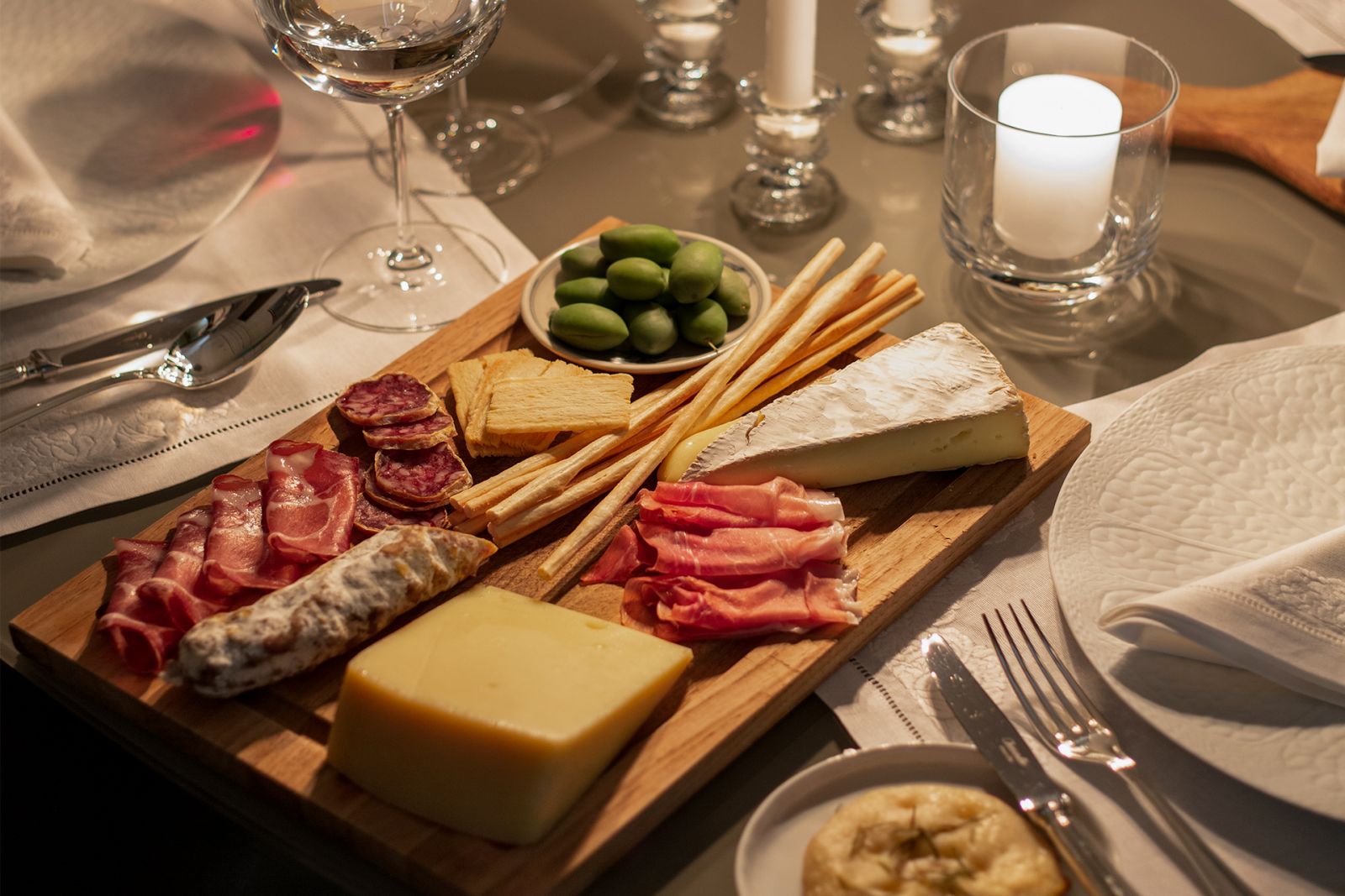A cheeseboard at a dinner in Manila