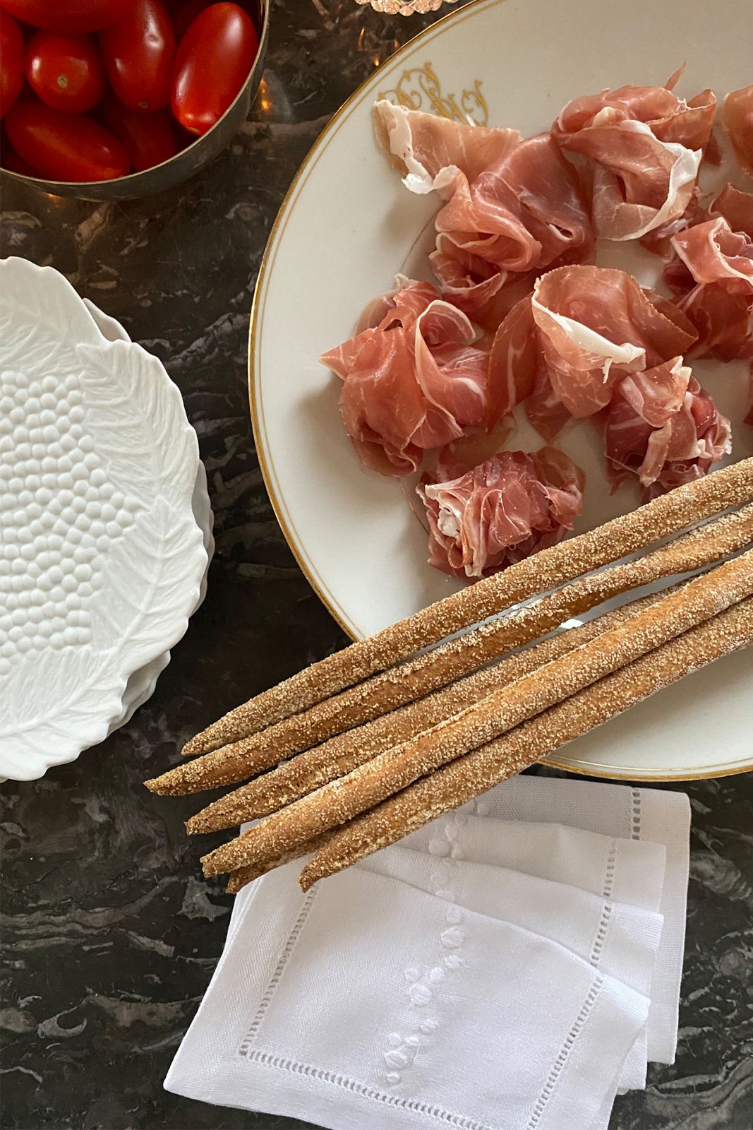 Meat and breadsticks at a dinner in Switzerland