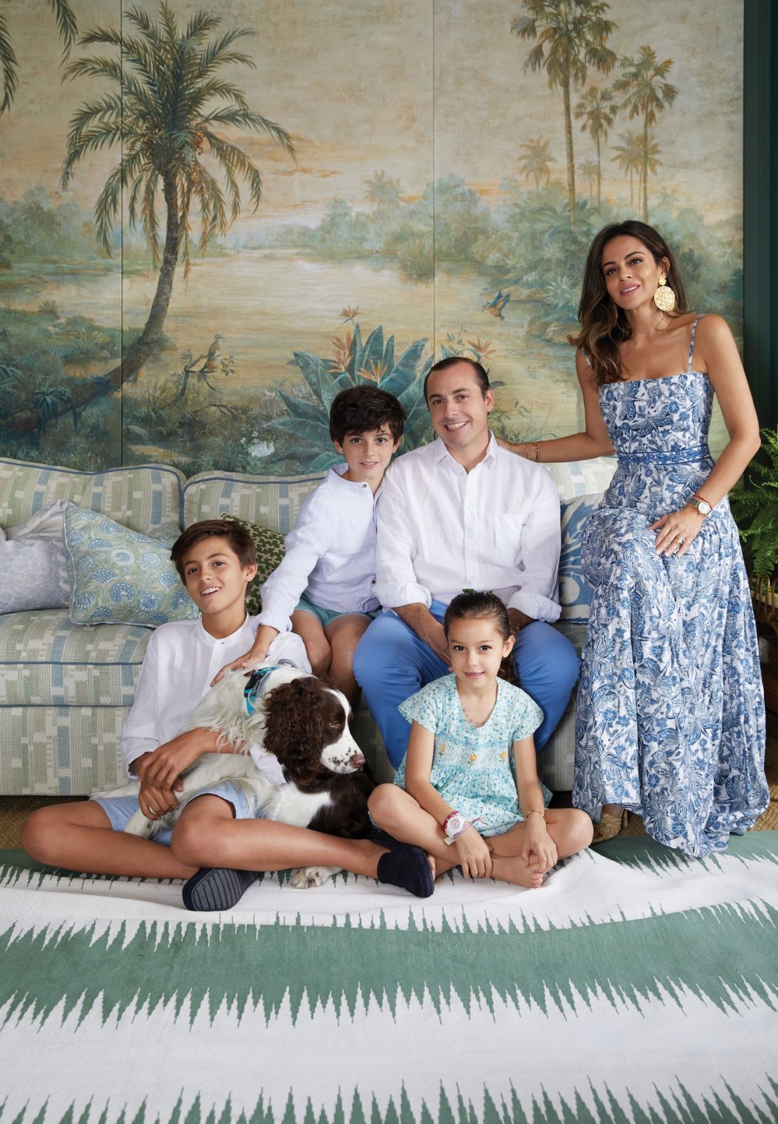 Ale Mora with husband Michael Brennan and children Daniel, Michael and Macarena in their Torreon Library at home in Madrid