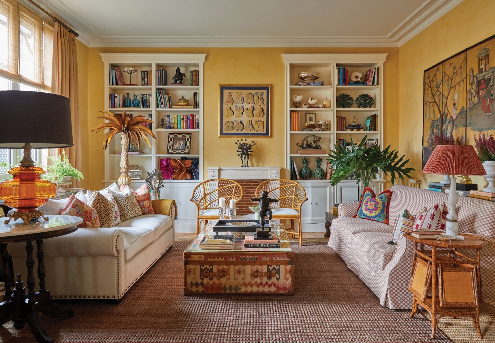 Sofas designed by Mora in the sitting room blend seamlessly with Pedro Friedberg’s Alphabet and Fernando Botero’s Bailarina