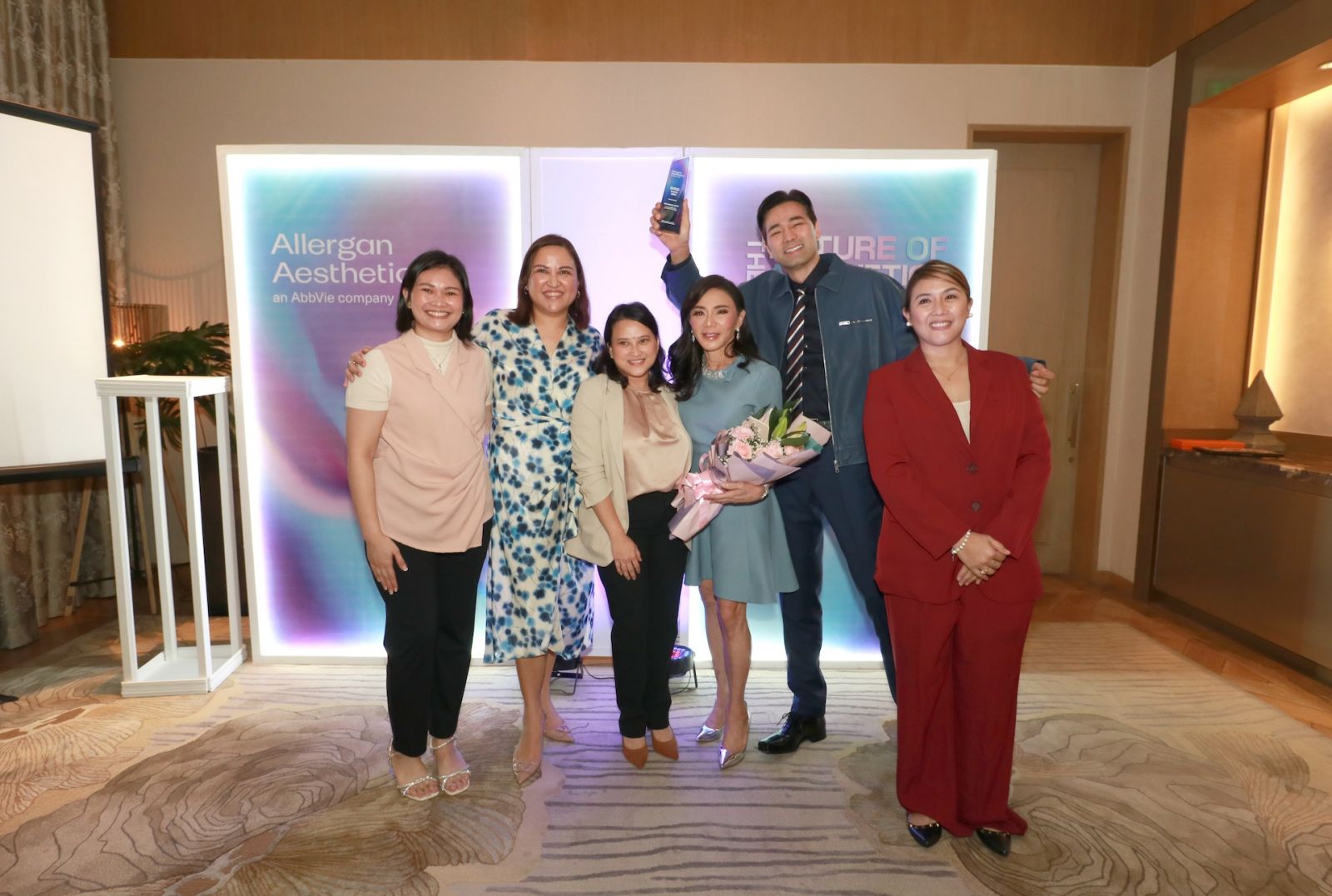 Dr Vicki Belo and Dr Hayden Kho, Jr with the Belo Medical Group team receiving the prestigious Gold Award from Allergan Aesthetics