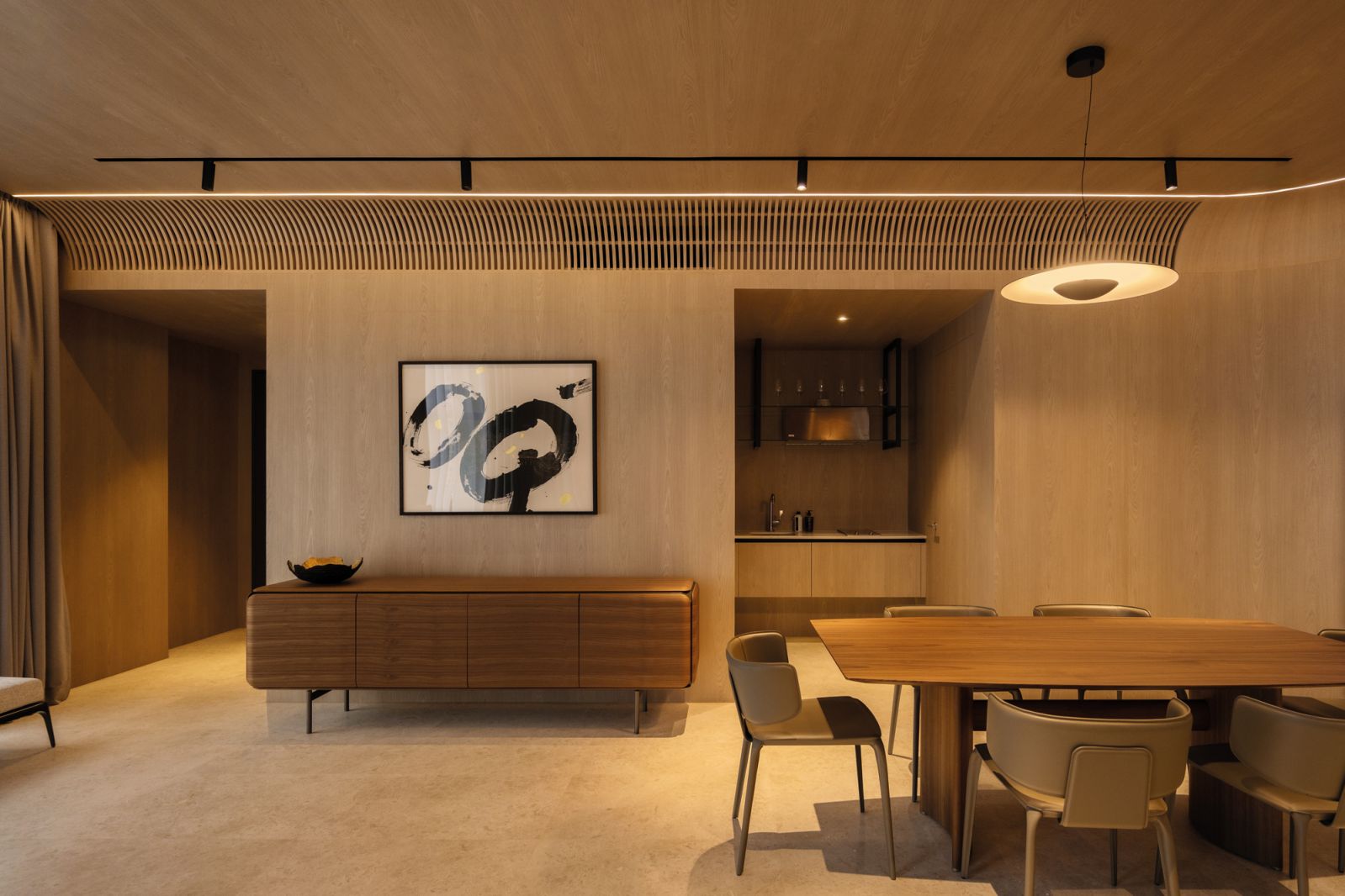 The eye is drawn to the black-and-white painting by Korean artist Jieun Park, representing a welcome to Singapore for the American homeowner