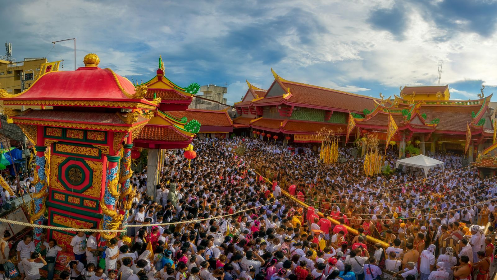 Thailand, Phuket, Phuket Town, Jui Tui (Chinese Taoist temple), people gathered at temple entrance during Phuket Vegetarian Festival