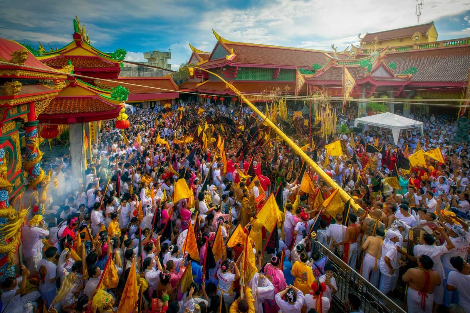 Thailand, Phuket, Phuket Town, Jui Tui (Chinese Taoist temple), people gathered at temple entrance during Phuket Vegetarian Festival