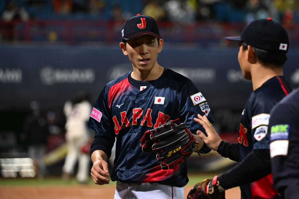 TAIPEI, TAIWAN - NOVEMBER 18: Pitcher Shosei Togo of Japan reacts after the third inning during the WBSC Premier12 Opening Round Group B game between Japan and Dominican Republic at Taipei Tianmu Baseball Stadium on November 18, 2024 in Taipei, Taiwan. (Photo by Gene Wang/Getty Images)