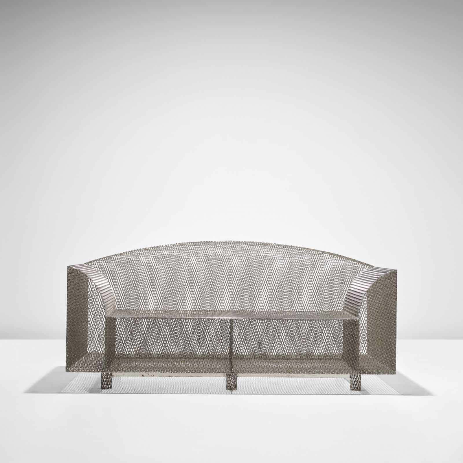 Shiro Kuramata’s early work ‘How High the Moon’, a two-seater sofa design in 1986, produced 1987 with nickel-plated steel mesh and nickelplated steel. It sold for GBP177,800 in the May 2024 auction (Photo: Courtesy of Phillips)