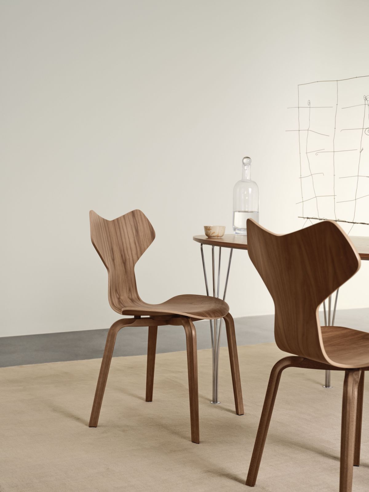 The Fritz Hansen Grand Prix chair in walnut