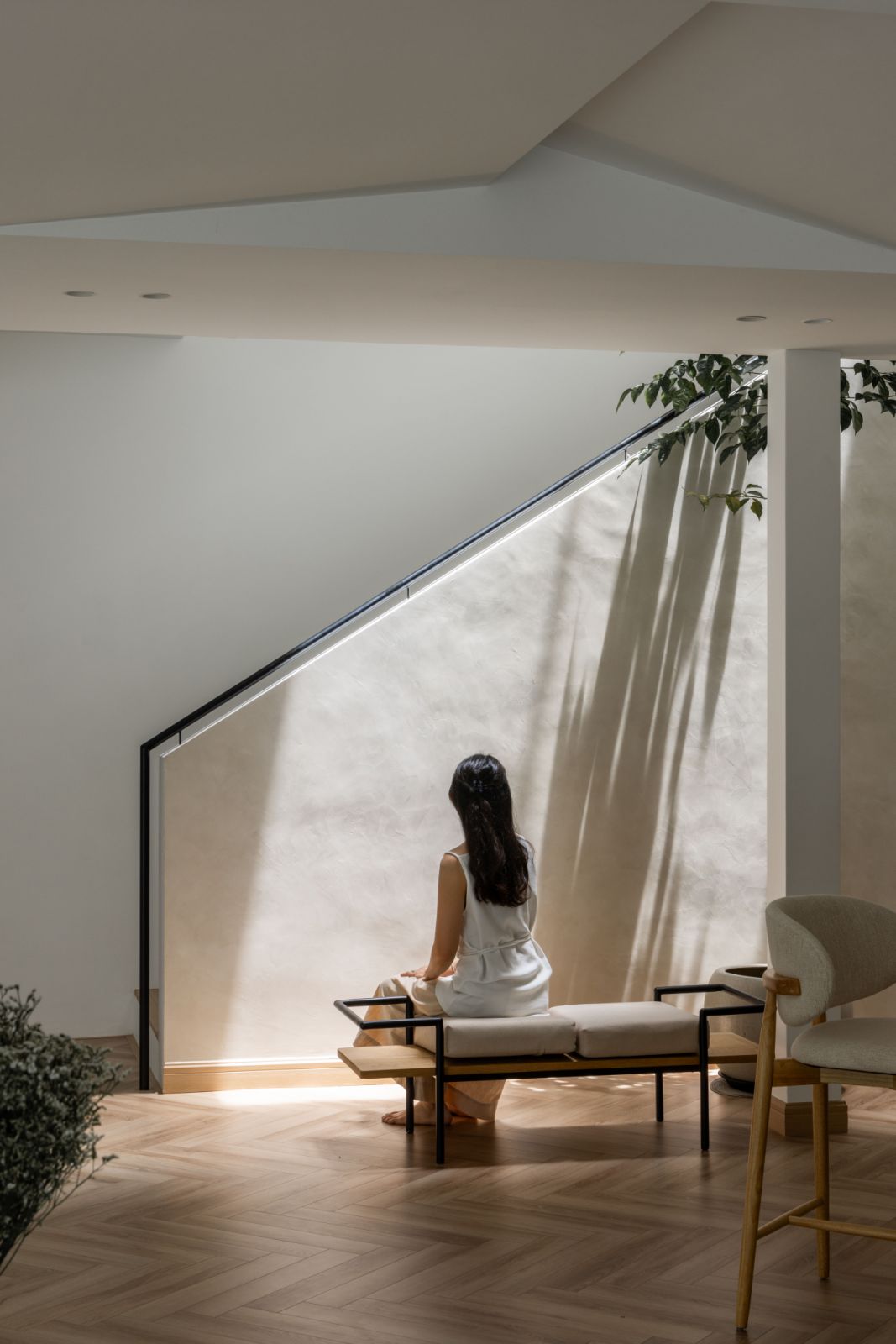 This contemplative spot encapsulates the harmonious blend of functionality, natural light, and connection to nature