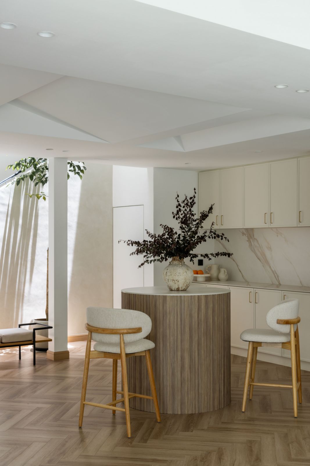 The raised position takes advantage of the natural light that streams through the sky light