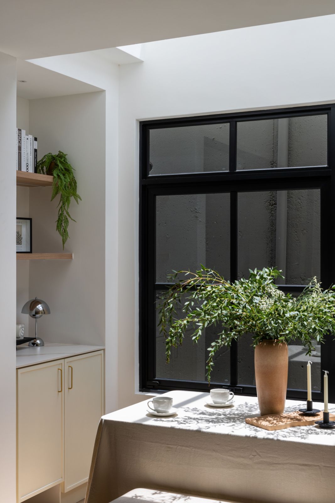 The kitchen skylight is one of Framework Studio’s most effective design interventions, bathing the culinary space in natural illumination