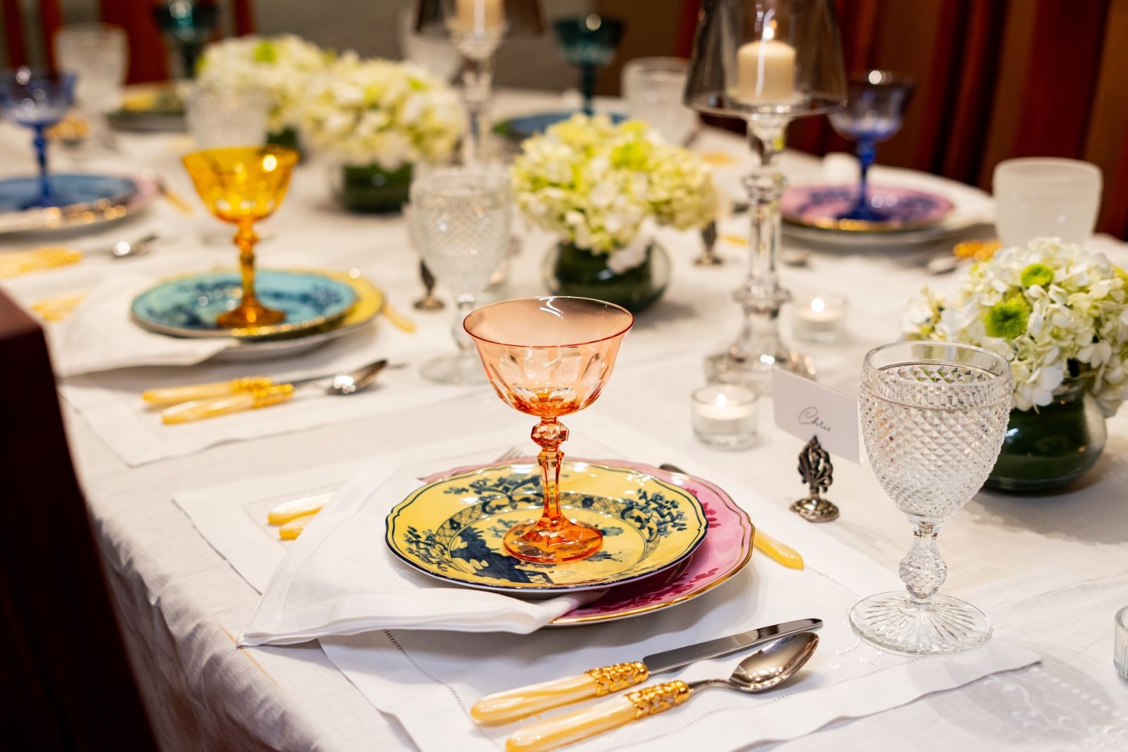 Rialto Glass Coupes by Sir/ Madam, plates by Ginori 1735, goblet by Vista Alegre and cutlery by Vietri