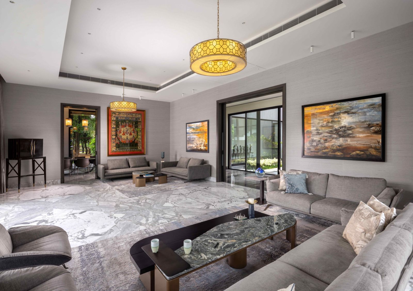 Vibrant colours of art pieces amidst solid shades of neutrals