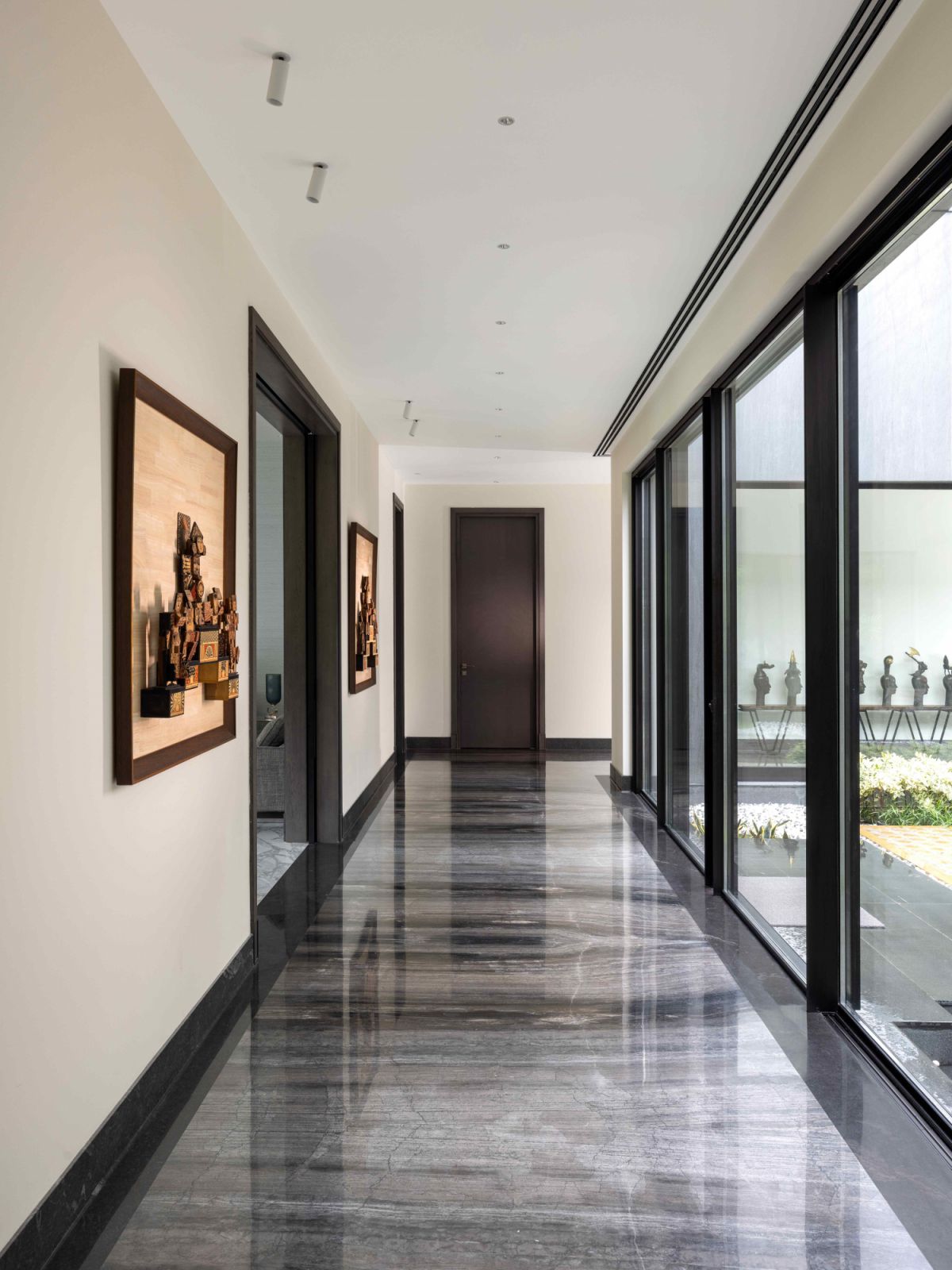 Spanish marble adds depth and character along the corridor