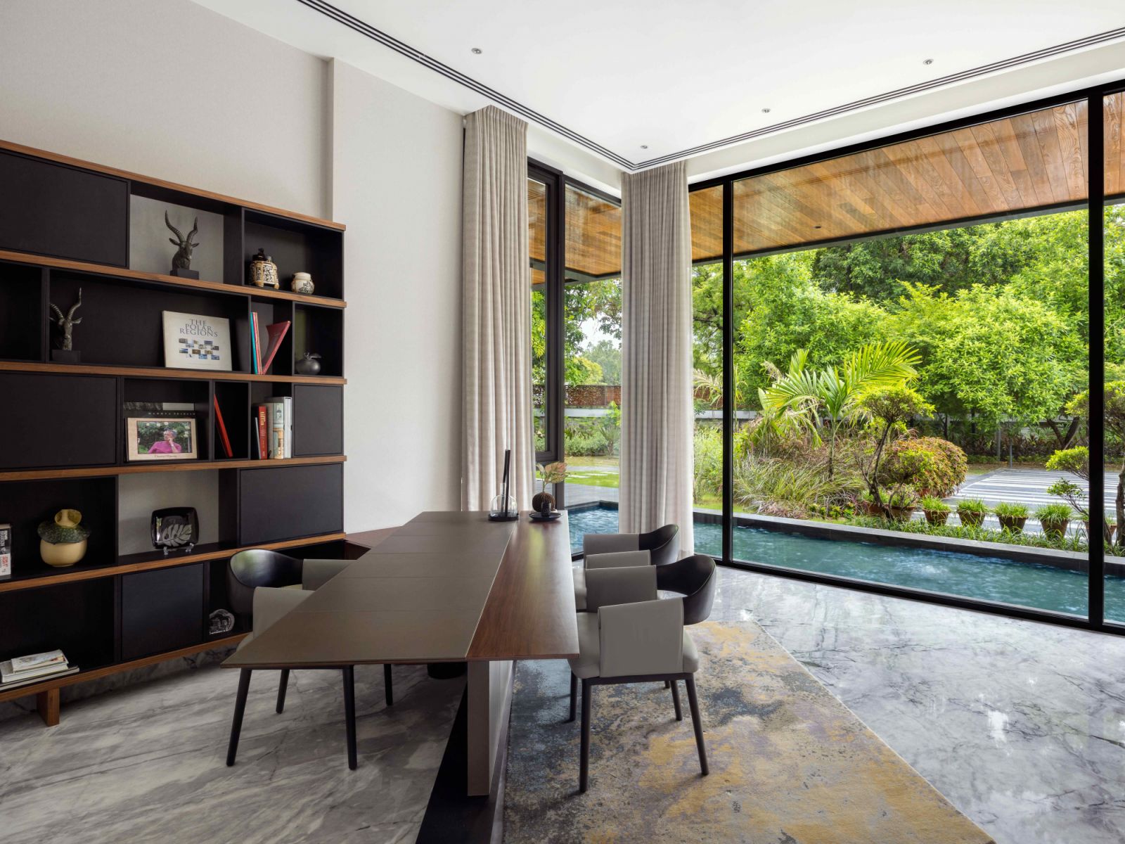 Wood and bespoke textures in the office reflect the artistic personality of the owner
