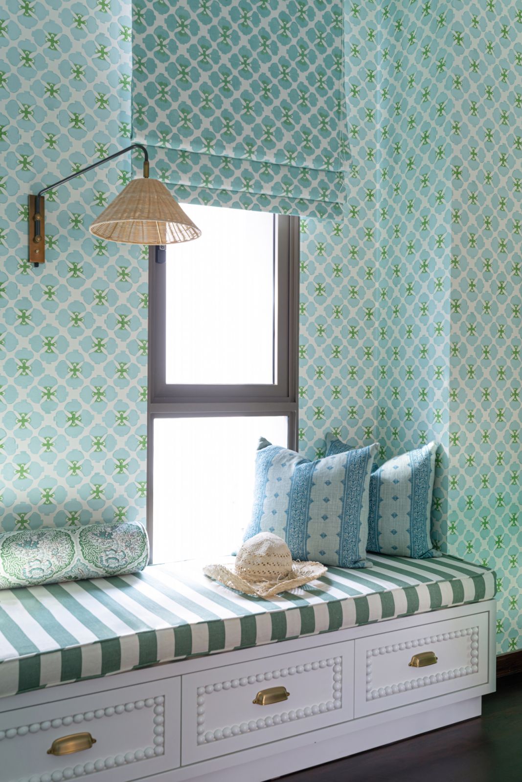 The calming blue and green tones of this alluring corner are given a lift by the mellow sunlight that filters in