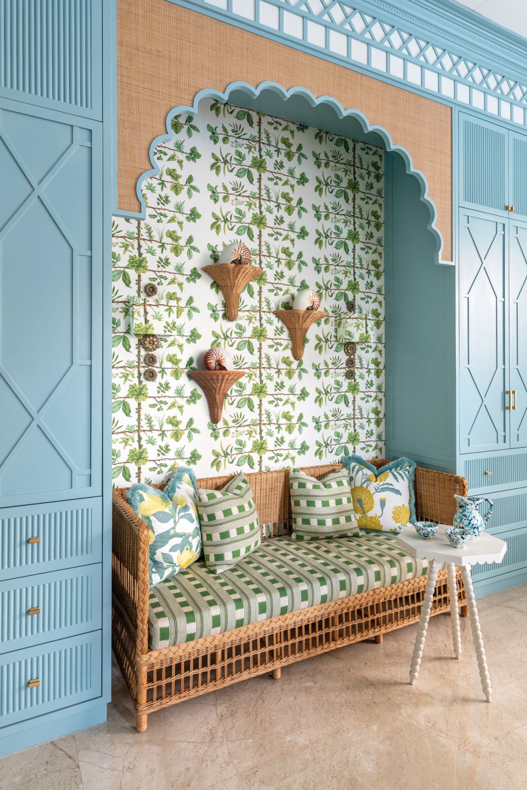 The dining space also features a built-in seating area with a scalloped pelmet, storage space and a hidden pantry