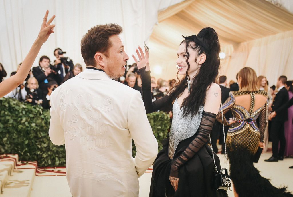 NEW YORK, NY - MAY 07: Elon Musk and Grimes attend the Heavenly Bodies: Fashion & The Catholic Imagination Costume Institute Gala at The Metropolitan Museum of Art on May 7, 2018 in New York City. (Photo by Jason Kempin/Getty Images)