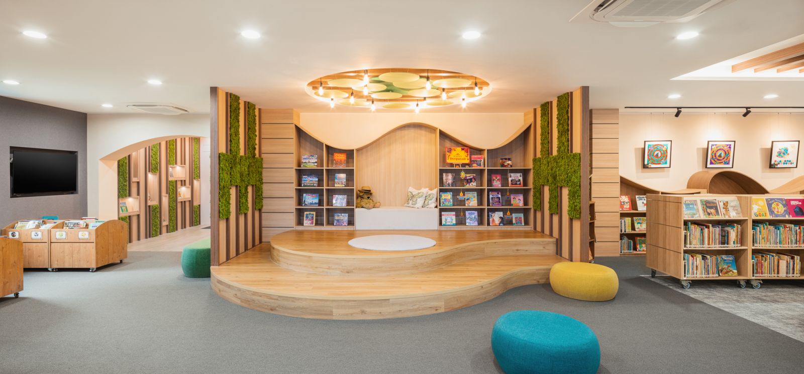 The library at Tanglin Trust School, designed by ATDR&Co using the Lamitak Corrado Roma Noce and Ibiza Nogal laminates