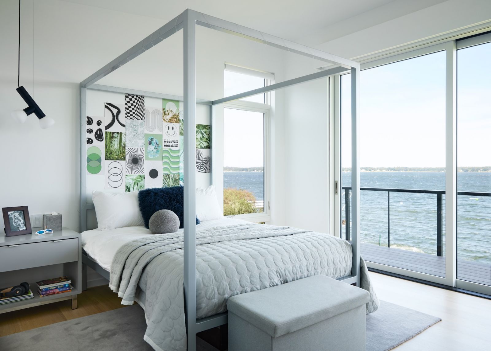 One of the children's bedrooms, which features a four-poster bed framing a quirky collage