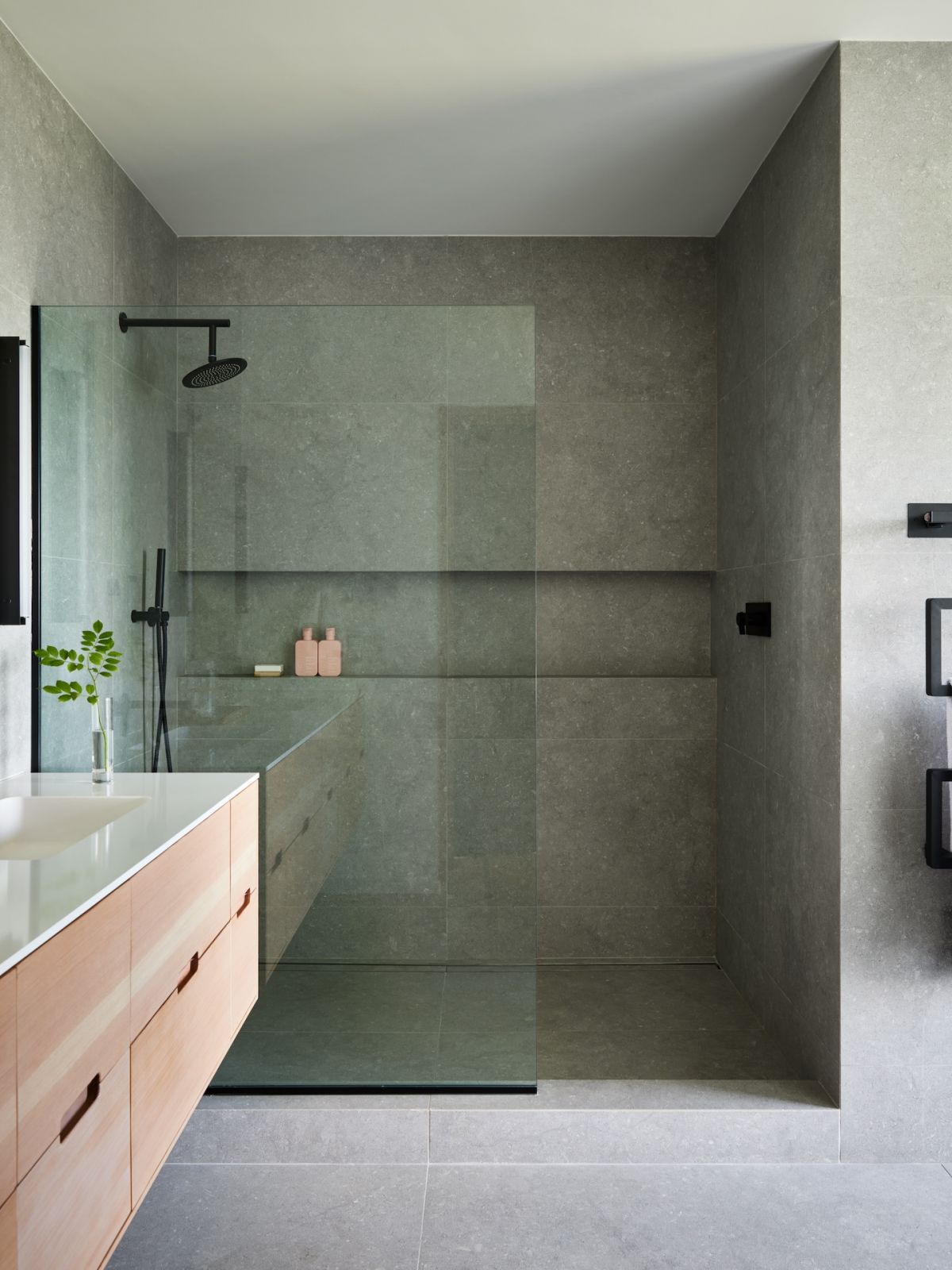 One of the home's bathrooms, highlighting concrete material
