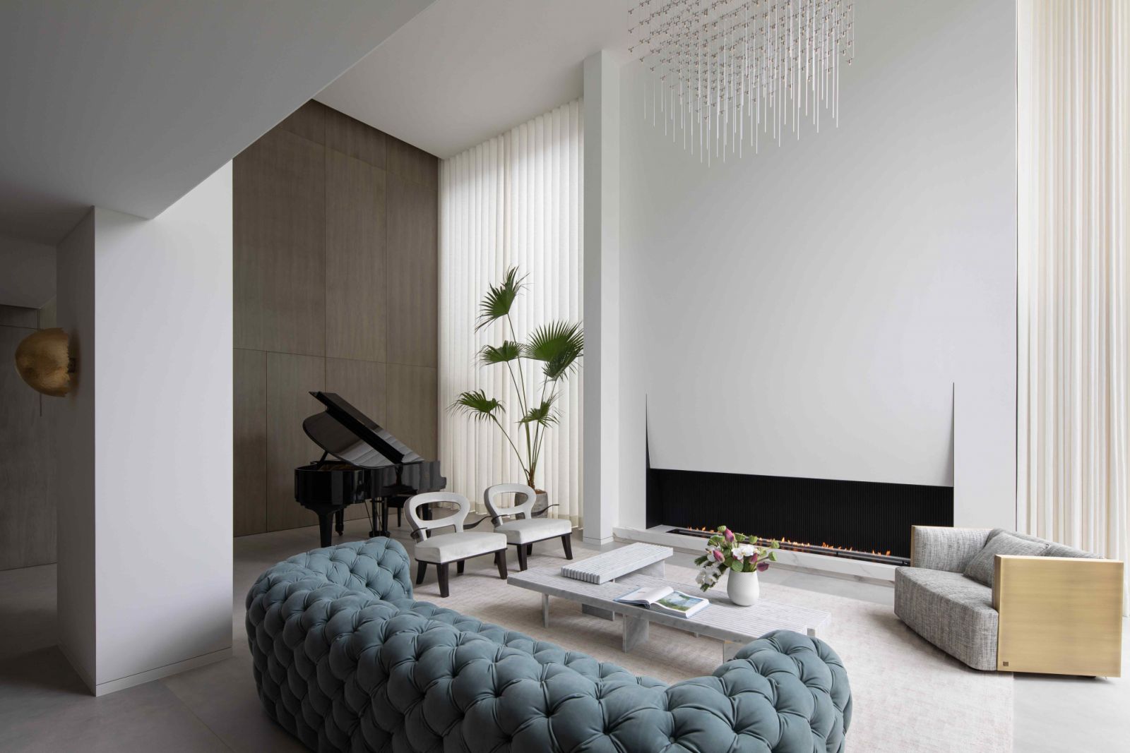 The lounge area with a six-metre high ceiling creates an ample yet comfortable openness