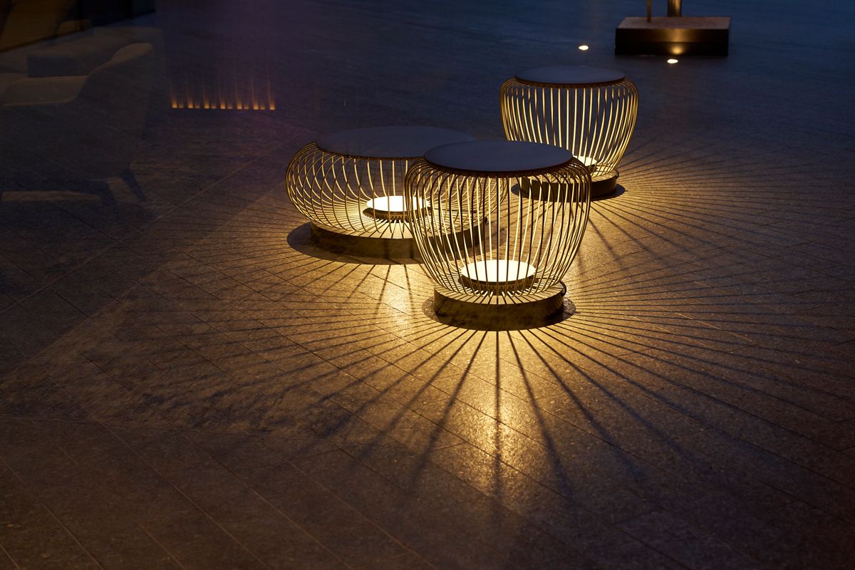 The floor lights in the Good Class Bungalow's courtyard cast dramatic a shadow play