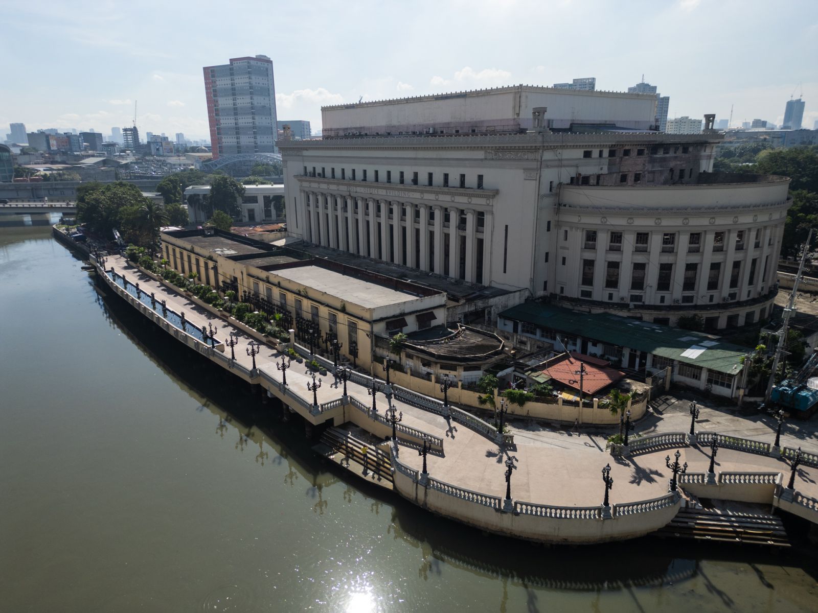 The Pasig River Esplanade stands before the Manila Post Office, which awaits its complete renovation