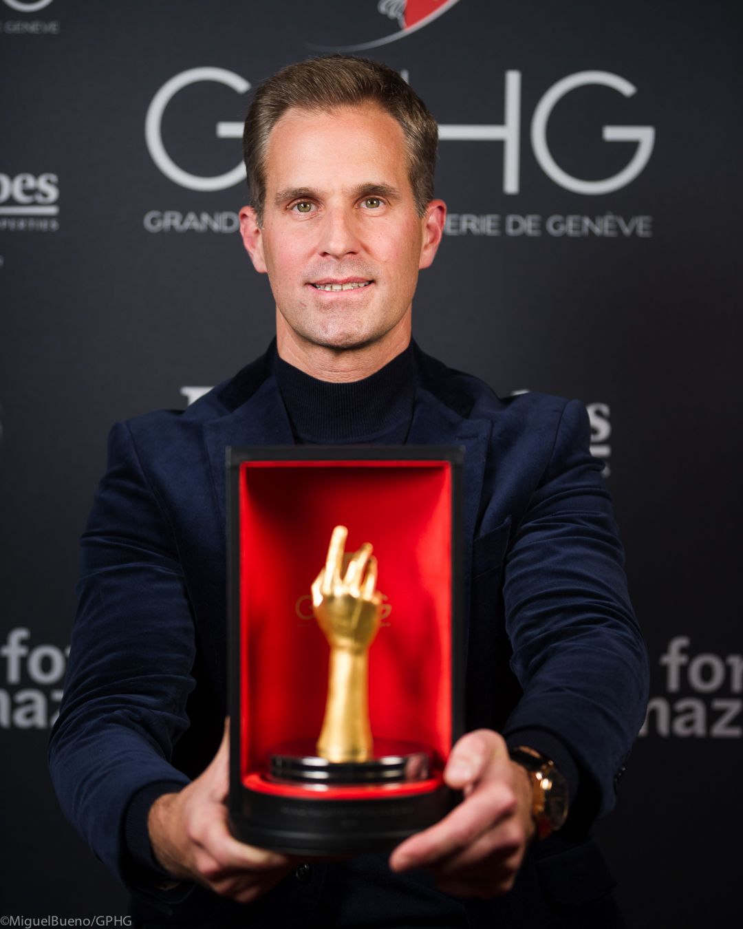 Christoph Grainger-Herr holding the GPHG award