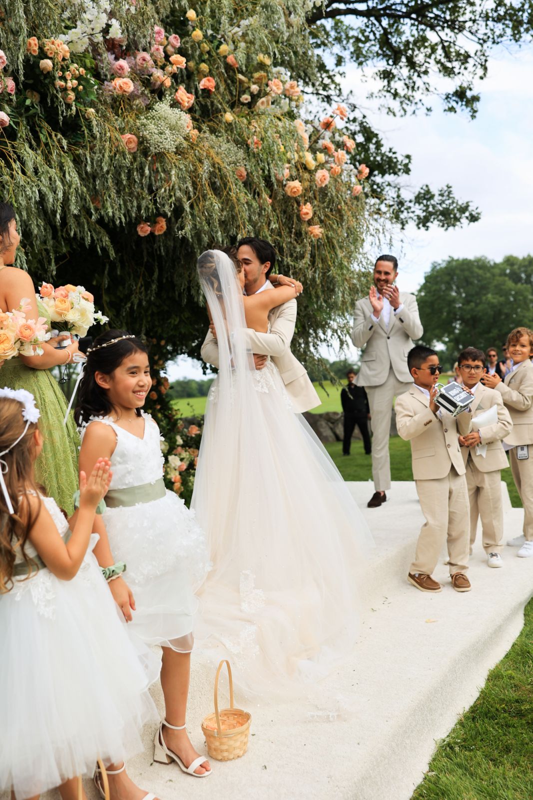 The bride and groom share a kiss