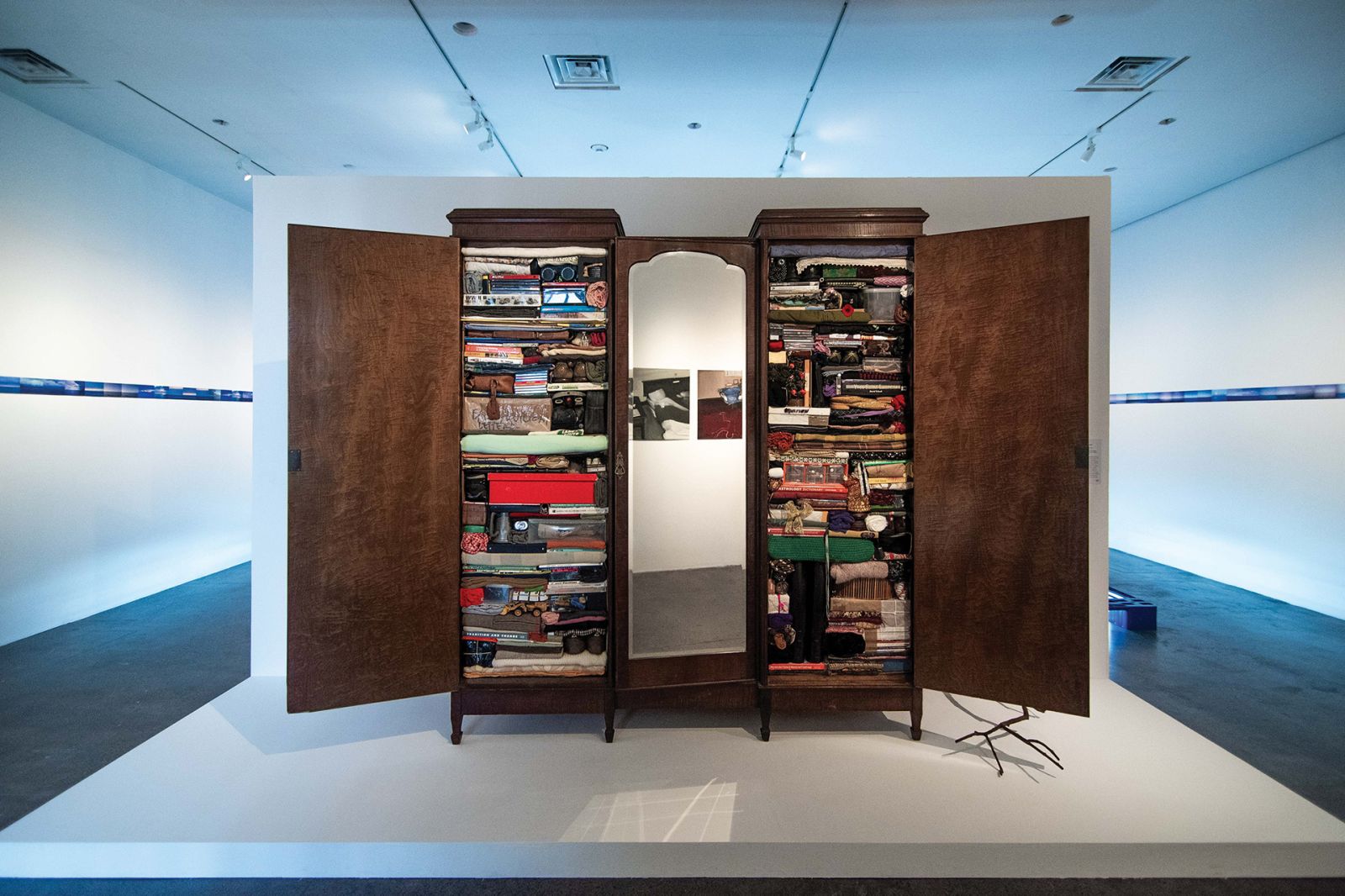 Isabel and Alfredo Aquilizan, ‘Foreigners: Project Another Country’, 2011, mixed media (artists’ personal belongings, Australian oak wardrobe with mirror, Mabini painting, Guava tree branch, red circular carpet) (Photo: Clefvan Pornela / Courtesy of Ateneo Art Gallery)