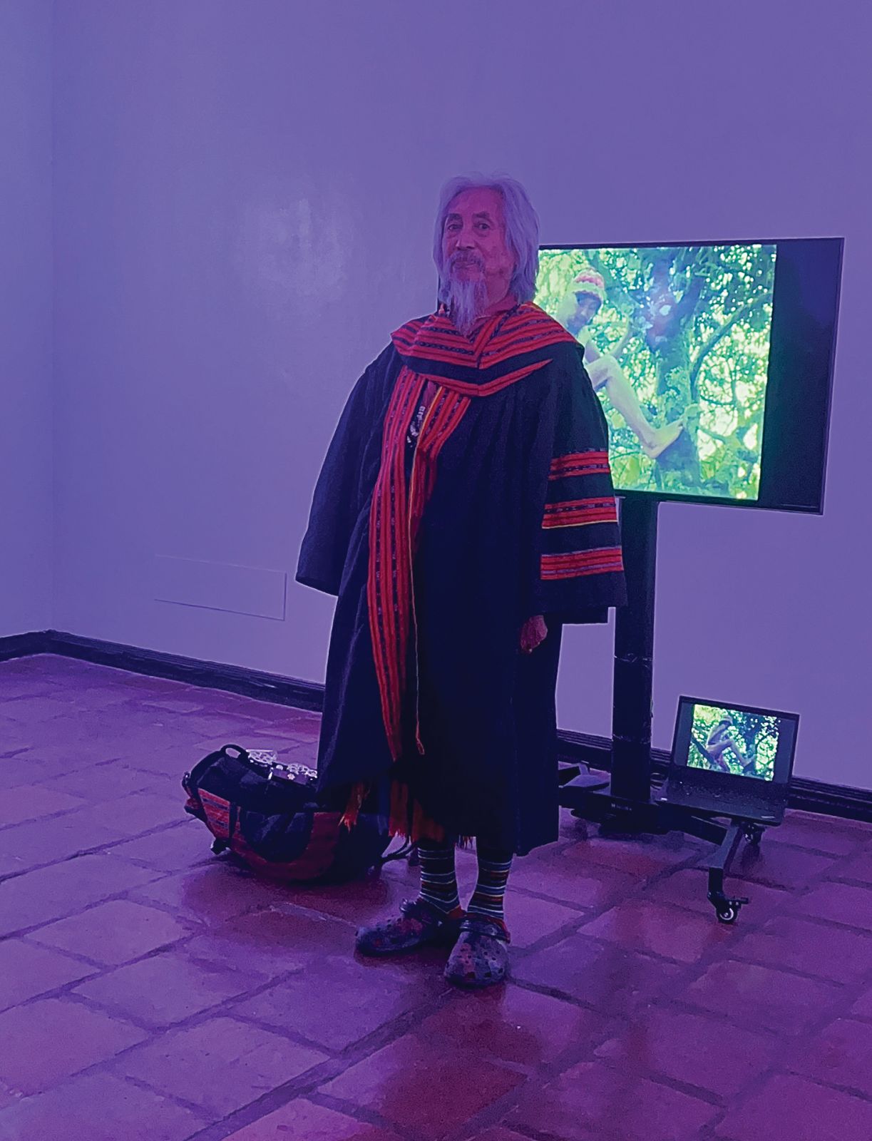 National Artist Kidlat Tahimik indulged the guests of Enrique Marty’s exhibition opening with a performance art, narrating the journey of Enrique de Malacca (the subject of one of his acclaimed films) and of himself, Eric de Guia (Photo: Courtesy of Kristine Guzmán)