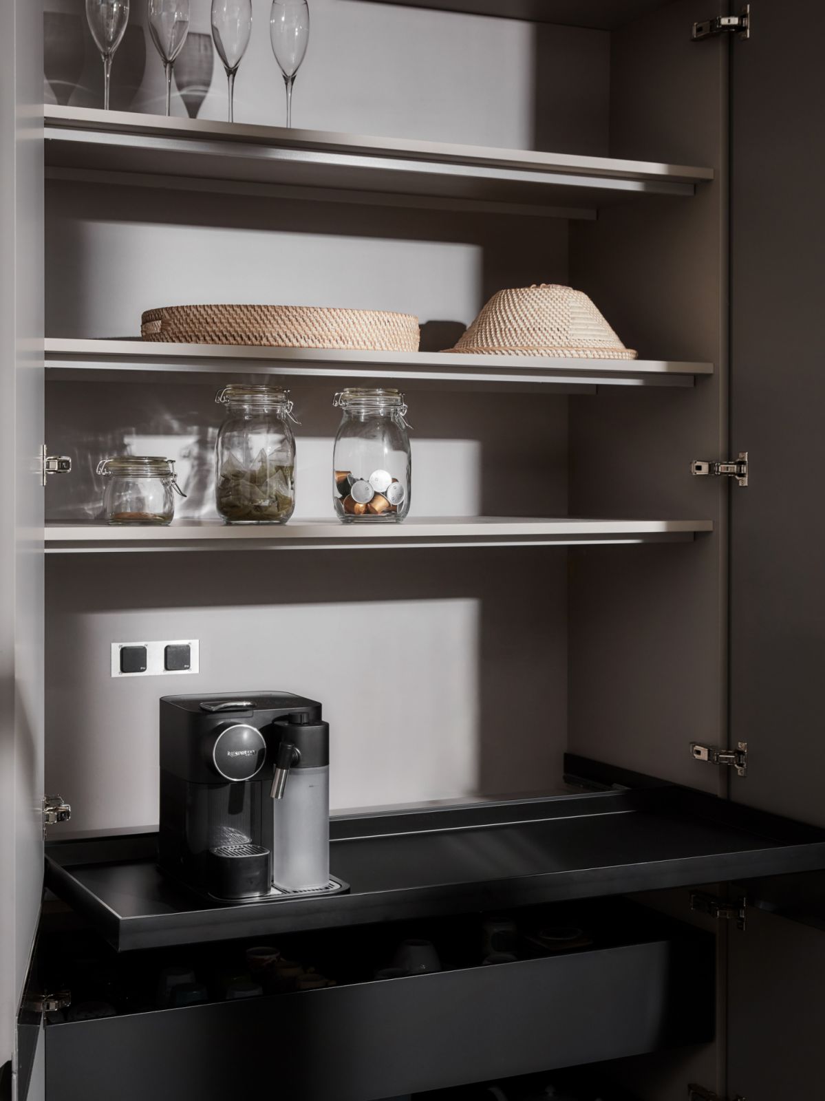 The coffee bar can be conveniently hidden away when it is not in use