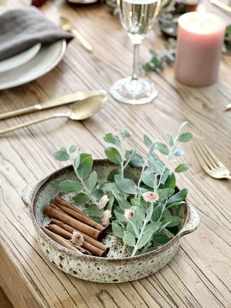 Details of the green Christmas tablescape in Rowena Gonzales's home