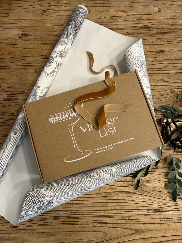 Repurposed leftover cut-offs from a renovation project turned into wrapping paper for a gift