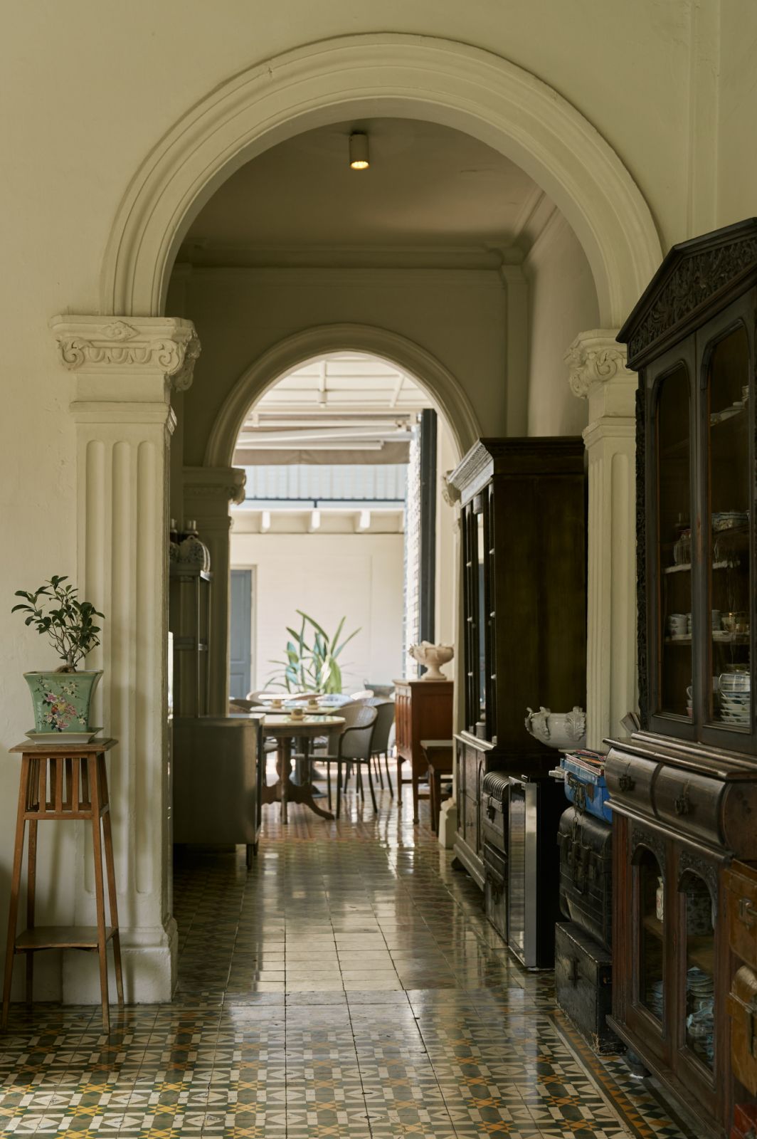 A corridor featuring the hotel's signature architectural elements
