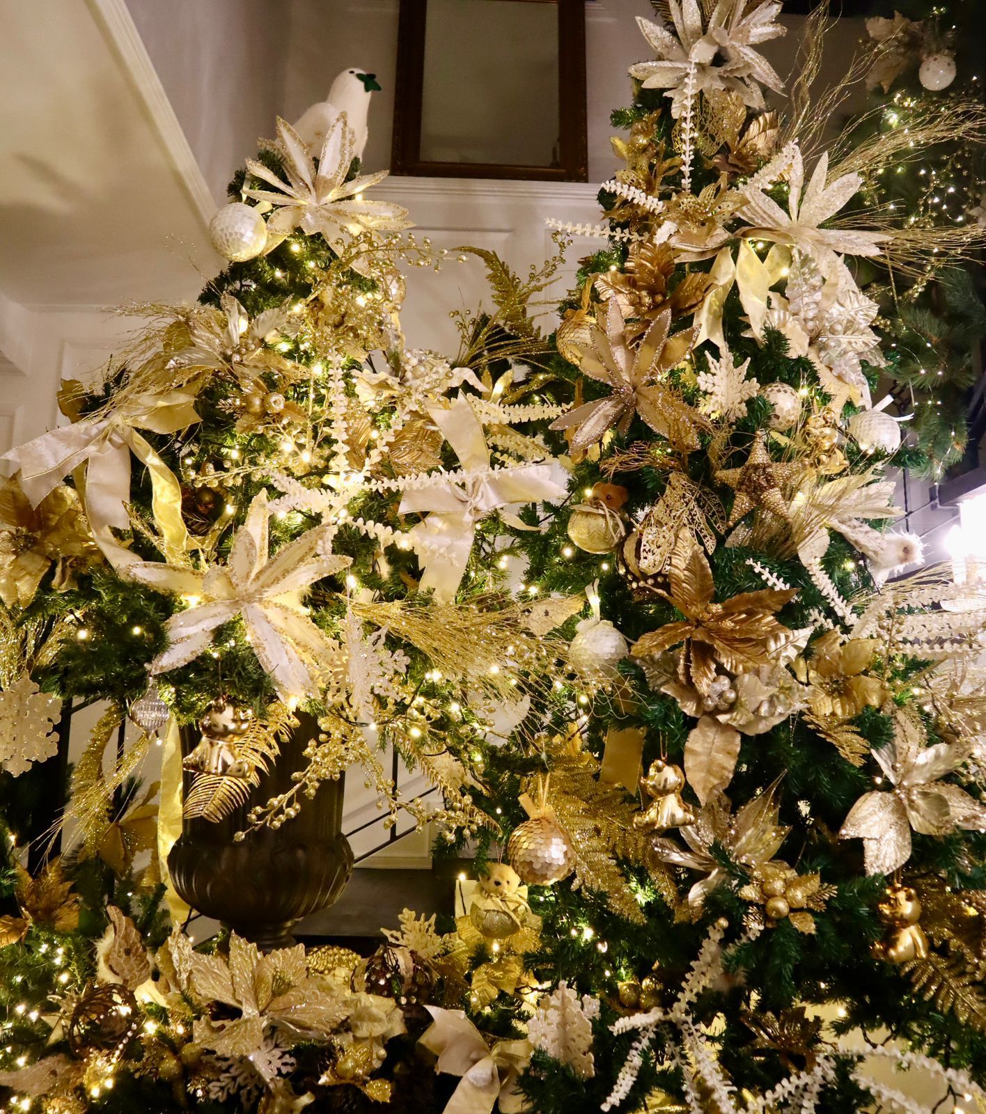 Close-up of the designs on the stairs by Julie Boschi’s Christmas tree