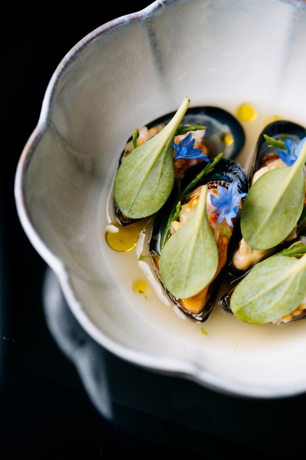 Mussels, aguachile, tomato, kaffir lime