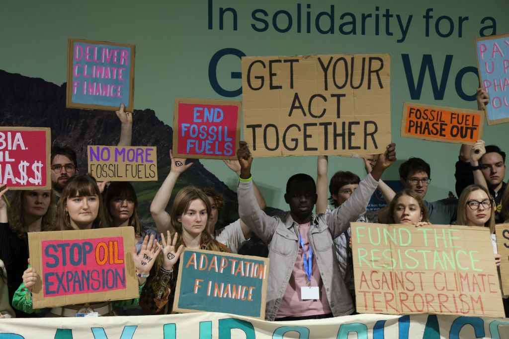 BAKU, AZERBAIJAN - NOVEMBER 22: Activists protest against fossil fuels and for climate finance on day eleven at the UNFCCC COP29 Climate Conference on November 22, 2024 in Baku, Azerbaijan. While today is scheduled to be the last day of the COP29, party delegates from numerous countries have voiced strong disappointment over the preliminary text of the final agreement, which will very likely send the conference into overtime. The COP29 is bringing together stakeholders, including international heads of stat